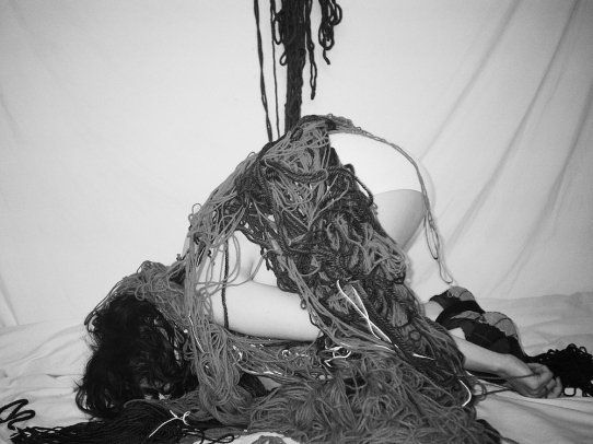 Sticky, Dark-Red Bloody Yarn, 2021. Photographed performance series with yarn.