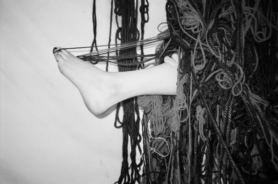 Sticky, Dark-Red Bloody Yarn, 2021. Photographed performance series with yarn.