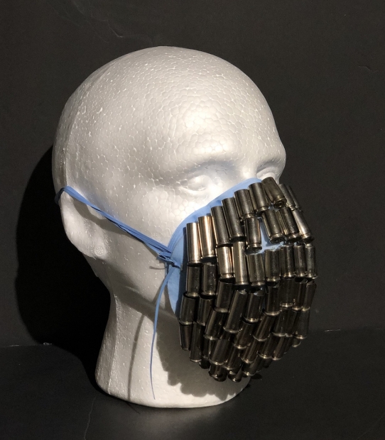 John Joseph Contreras Romero (Cowell ‘19), To Be Or Not To Be, 2020. Styrofoam mannequin head, mask, sewn bullet shell casings